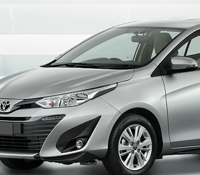 Ốp trang trí đèn pha - Màu đen sần (Dùng cho xe E MT, E CVT)
